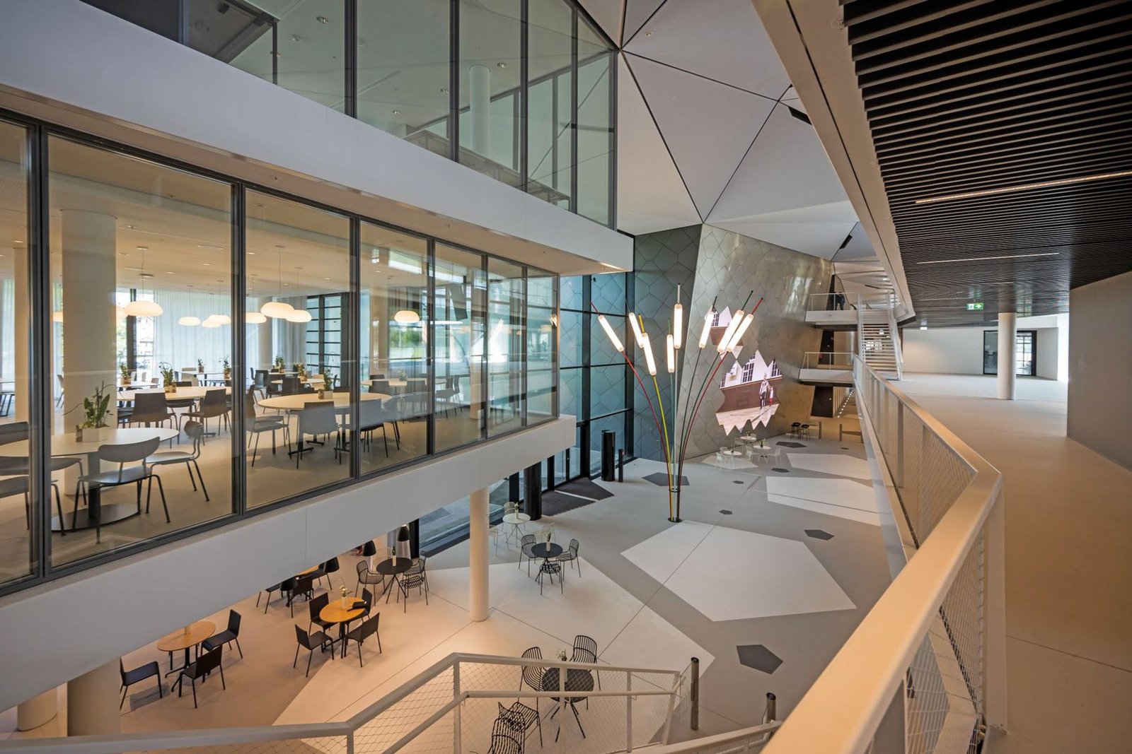 Bright atrium interior at DFB Campus